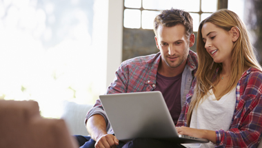 Couple looking at computer