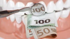 money in set of teeth