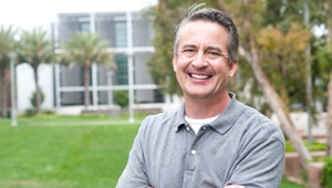 man smiling after getting dental implants in Phoenix