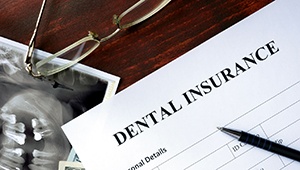 dental insurance paperwork for the cost of dental implants in Phoenix 