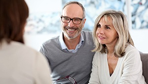 Patients speaking with their Phoenix implant dentist 