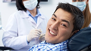 Relaxed man smiling in dental chair