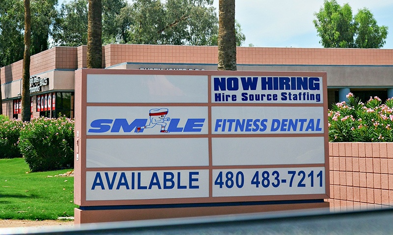 The Smile Fitness Dental Center street sign
