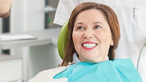 Smiling woman in dental chair