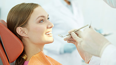 Smiling woman in dental chair