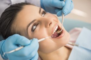 Woman having a dental examination.