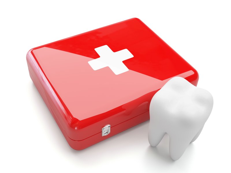 Illustration of tooth next to emergency kit