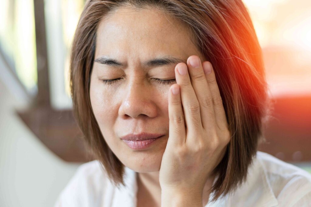 Woman with TMJ pain