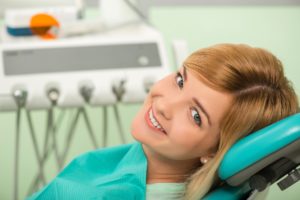 Young woman in dental chair